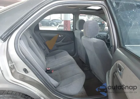 2001 Toyota Camry Le z USA, uszkodzony, nr VIN JT2BG22K010592881